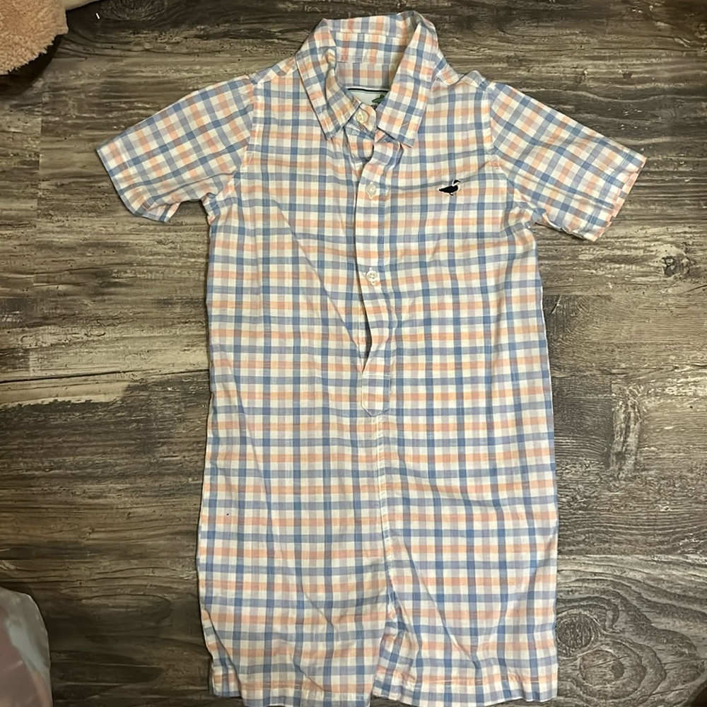 Properly tied baby boy romper